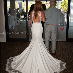 Beautiful Wedding dress. Excellent condition, beaded, heavily lined